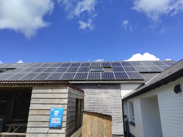 Rooftop solar panel installation supporting a business sustainability strategy