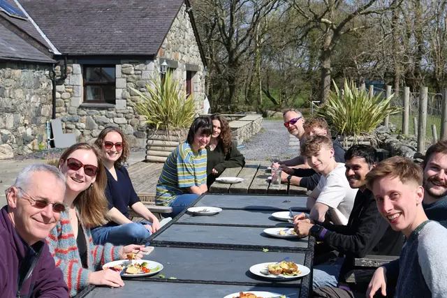 Greener Edge sustainability consultants gathered for an outdoor team lunch